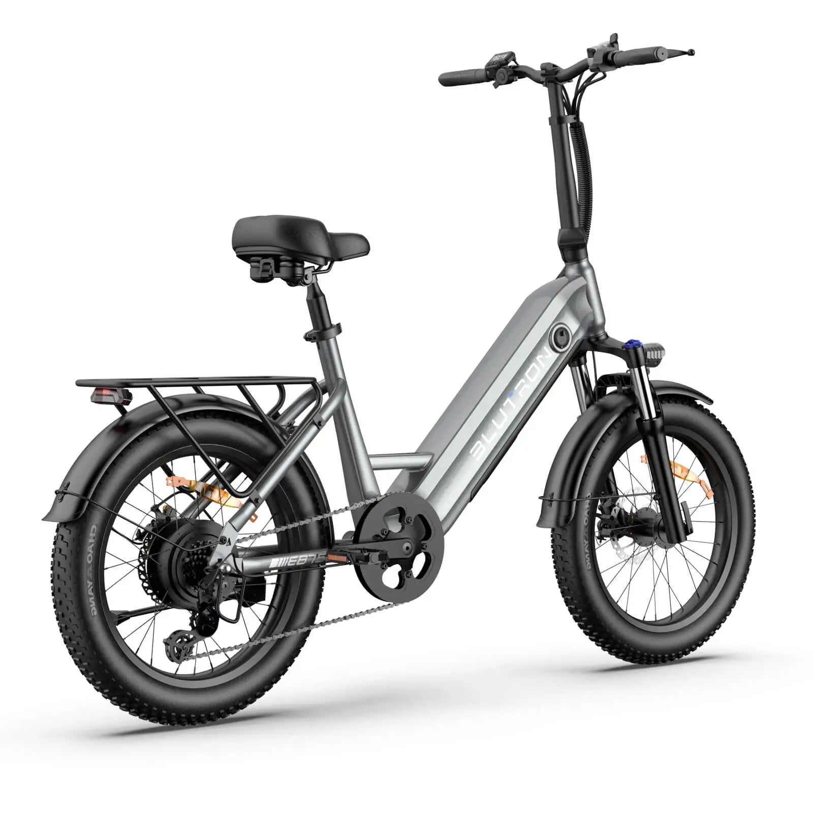 Blutron compact folding electric bike for urban daily commutes: Silver-gray model featuring "BLUTRON" logo, rear cargo rack, wide slip-resistant tires, front/rear disc brakes, handlebar controls, and a black seat, displayed against a clean white background.